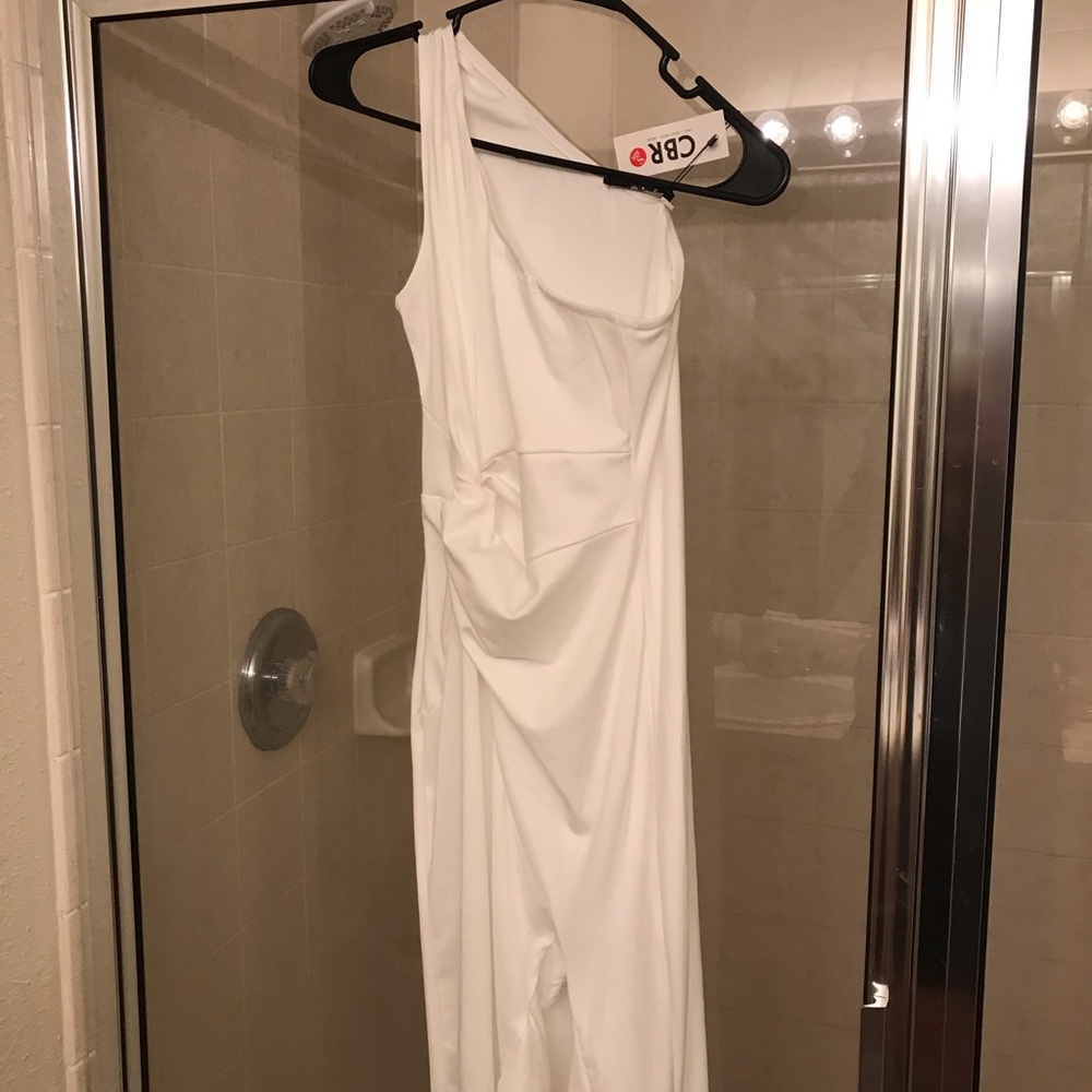 White dress with open bottom slit up thigh